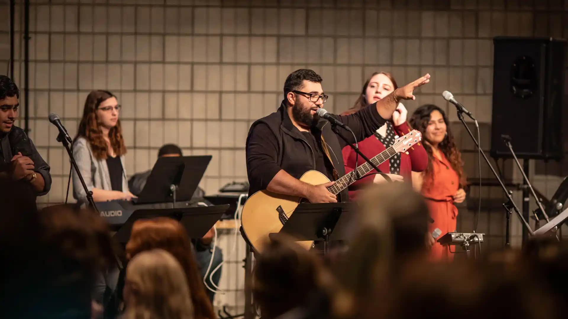 Chapel-Services Grace students serving the campus by leading people in worship during a Chapel service.